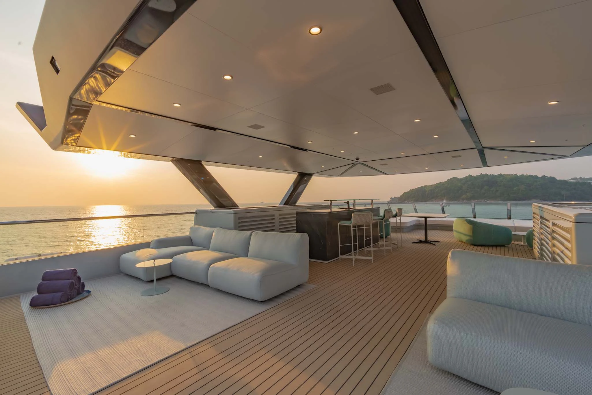 a large living room with a large pool aboard SPACECAT Yacht for Sale