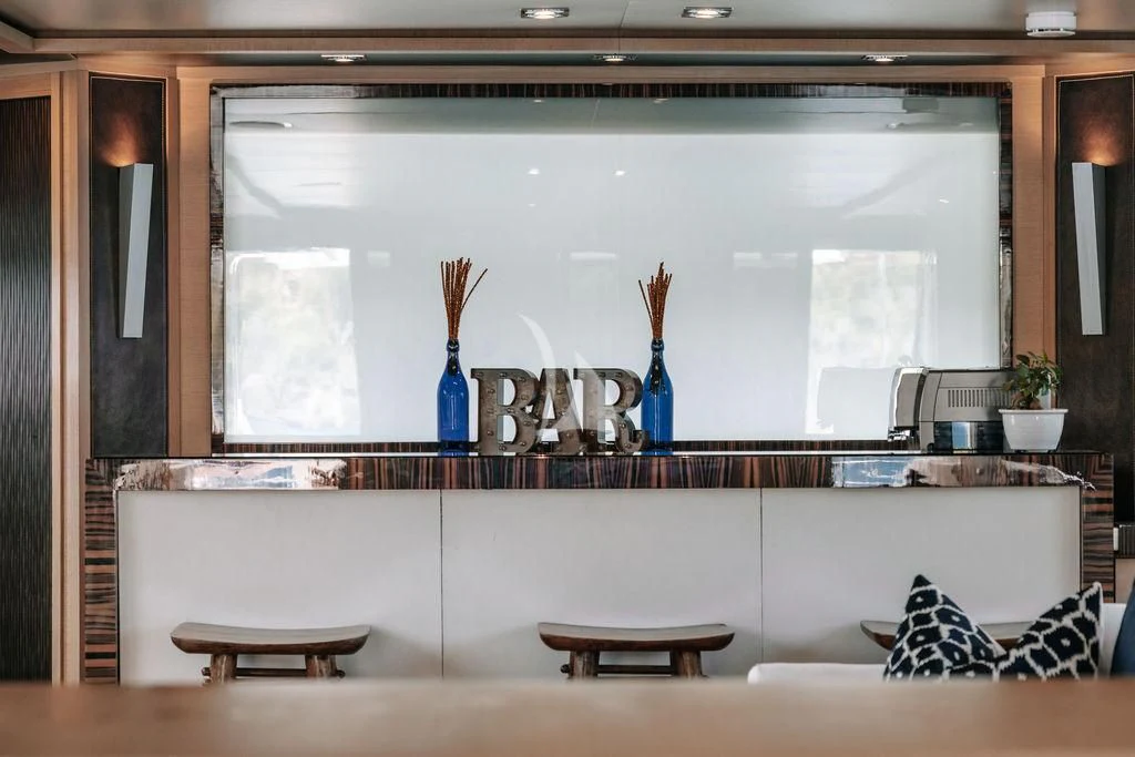 a kitchen with a large window aboard VANTAGE Yacht for Sale