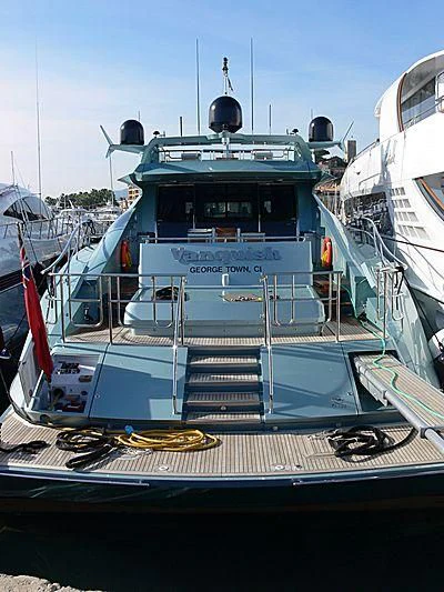 a boat with a crane on the deck aboard VANTAGE Yacht for Sale