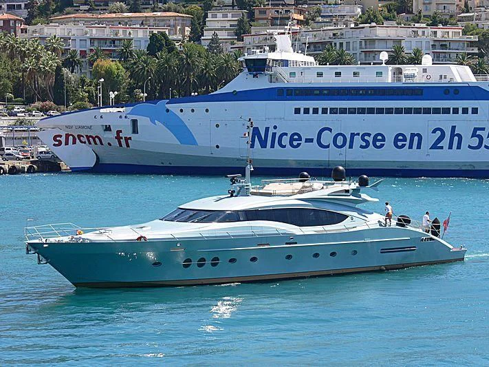 a large white boat on the water aboard VANTAGE Yacht for Sale