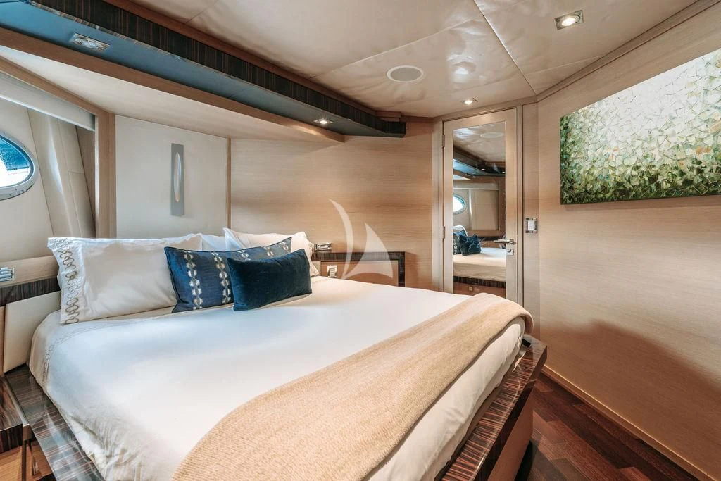 a bed in a room aboard VANTAGE Yacht for Sale
