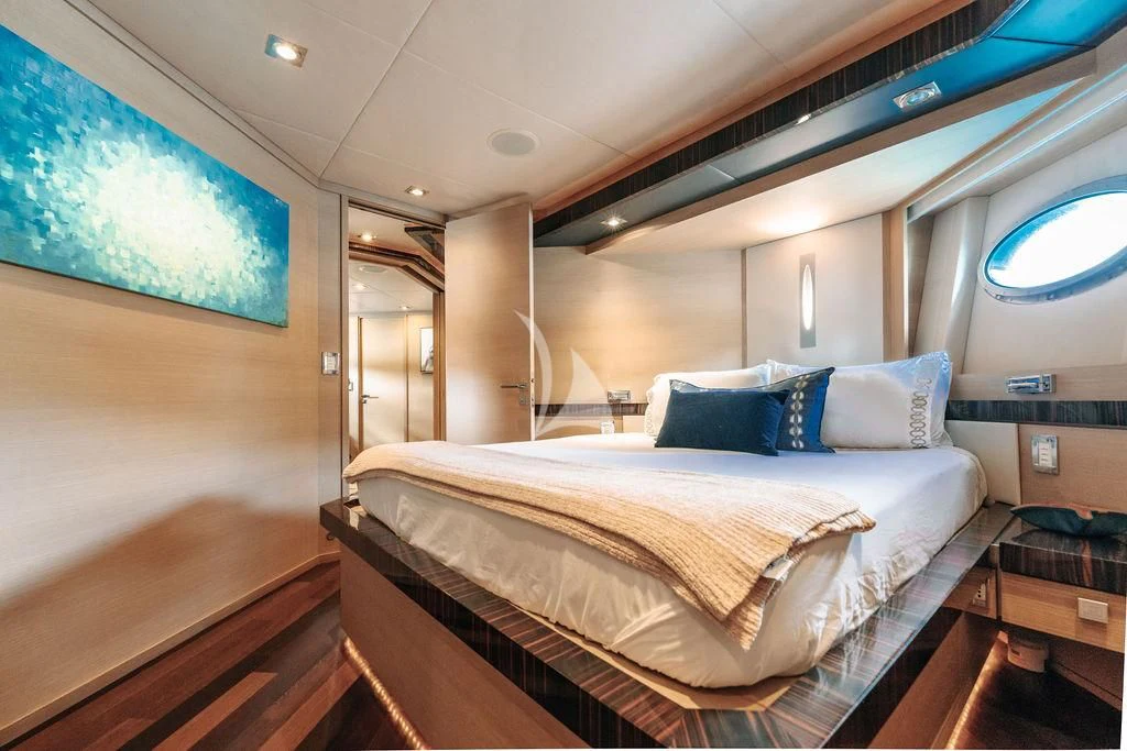 a bed in a room aboard VANTAGE Yacht for Sale