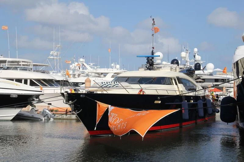 a boat with a flag on it aboard VANTAGE Yacht for Sale