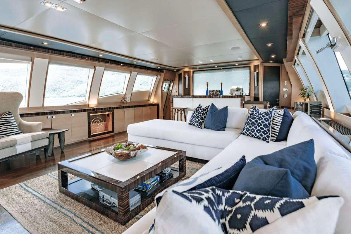 a living room with a large window aboard VANTAGE Yacht for Sale