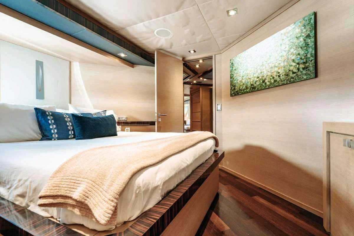 a bed in a room aboard VANTAGE Yacht for Sale
