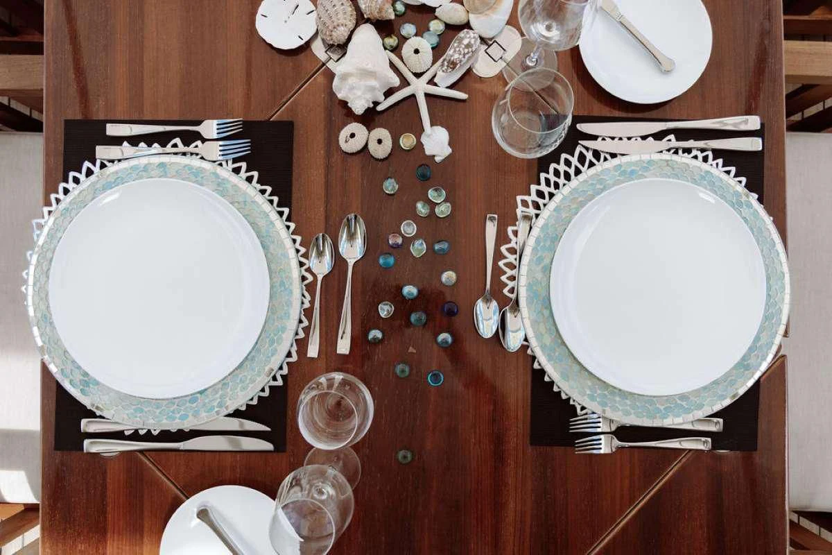 plates and bowls on a table aboard VANTAGE Yacht for Sale