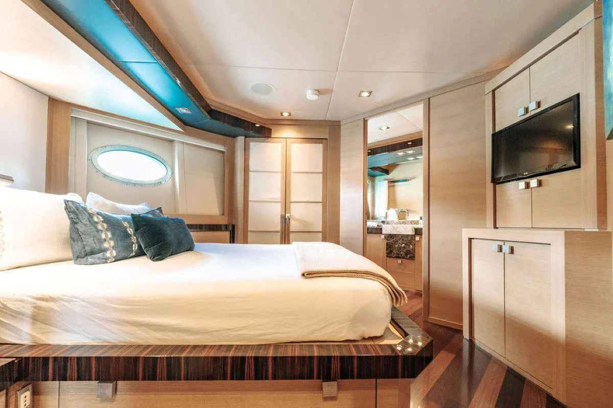 a bed in a room aboard VANTAGE Yacht for Sale