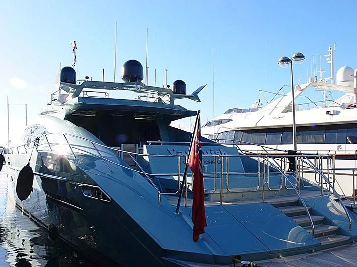 a large boat docked aboard VANTAGE Yacht for Sale