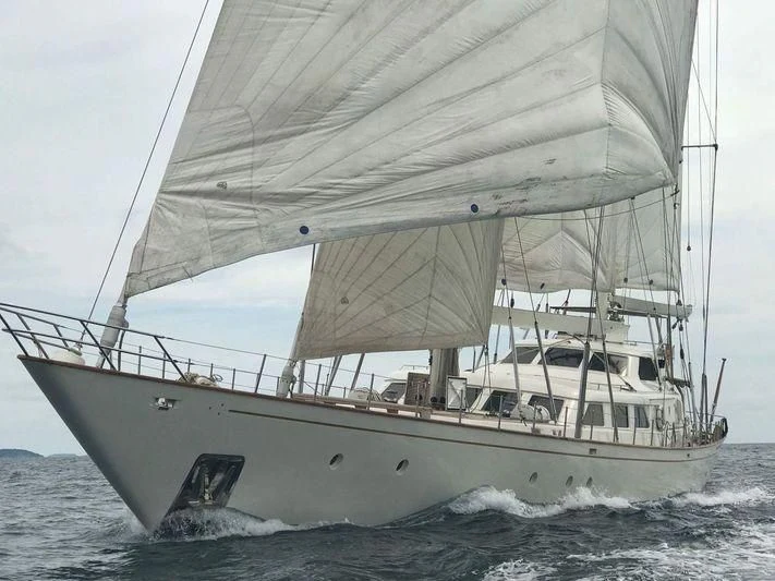 a large white boat in the water aboard INFINIUM Yacht for Sale