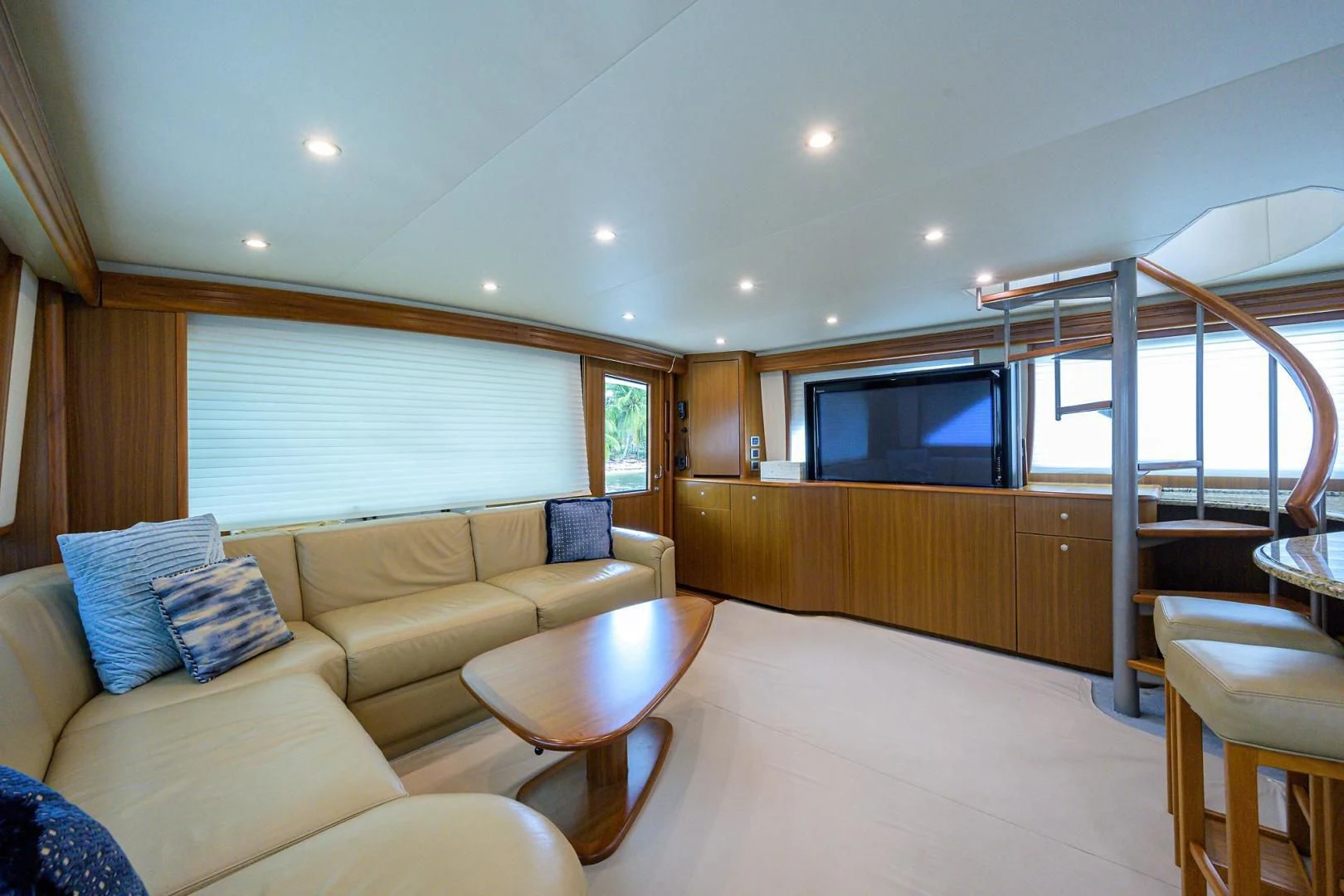 a living room with a sliding glass door aboard RITE ANGLER Yacht for Sale