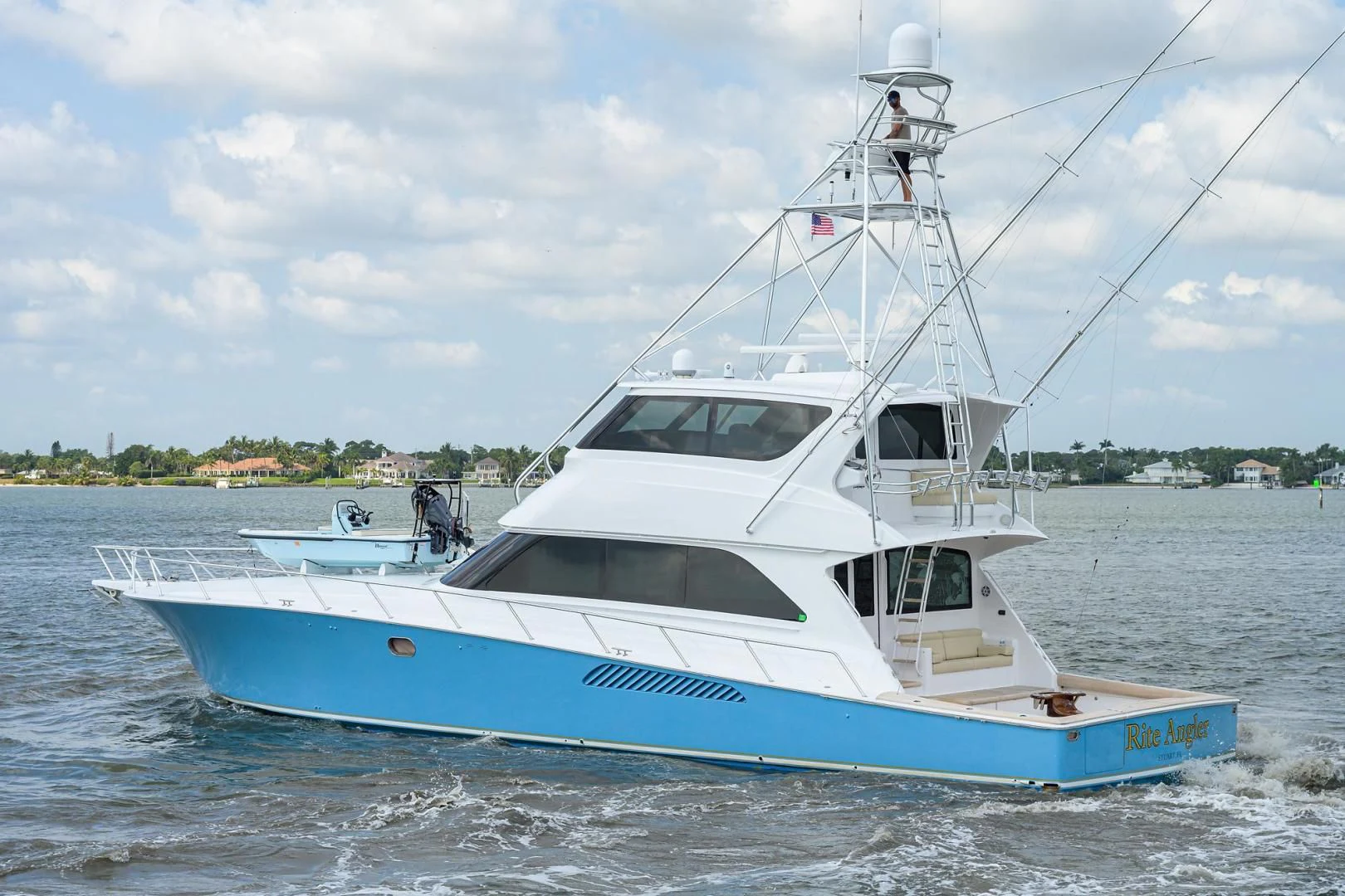 a white boat on the water aboard RITE ANGLER Yacht for Sale