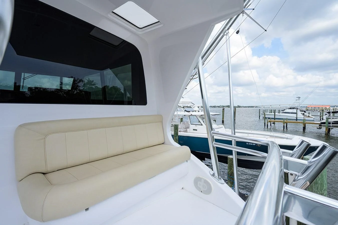 a white couch on a boat aboard RITE ANGLER Yacht for Sale