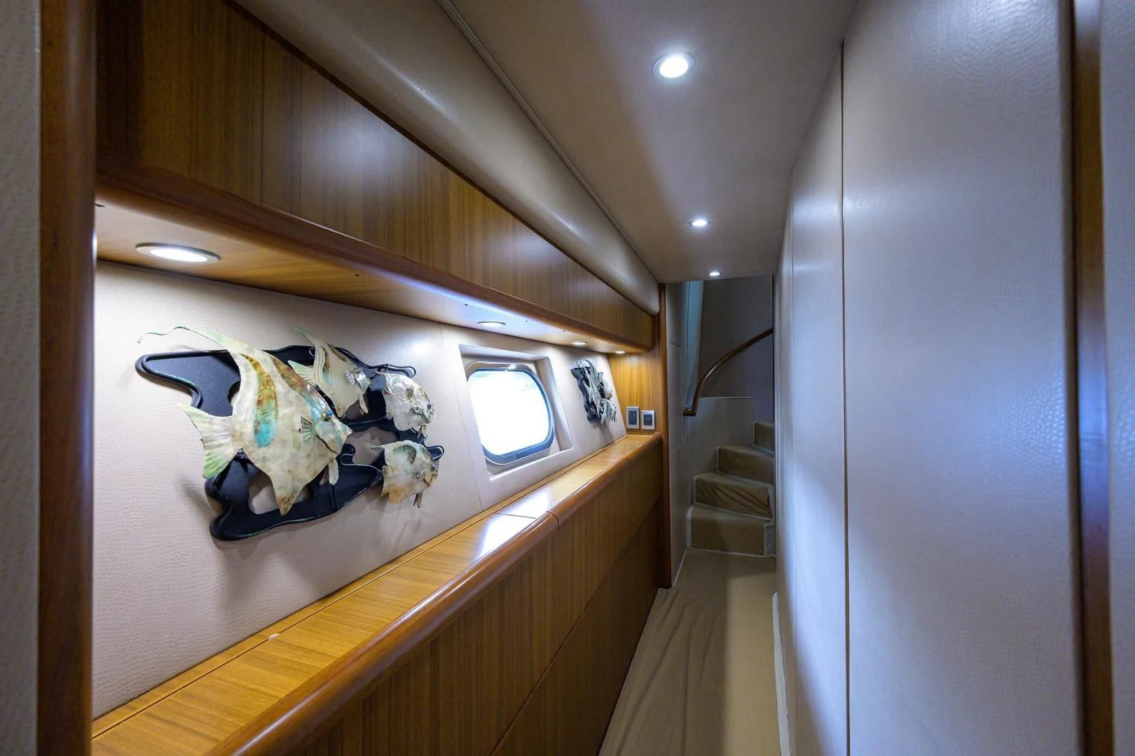 a room with a large mirror and a bench aboard RITE ANGLER Yacht for Sale