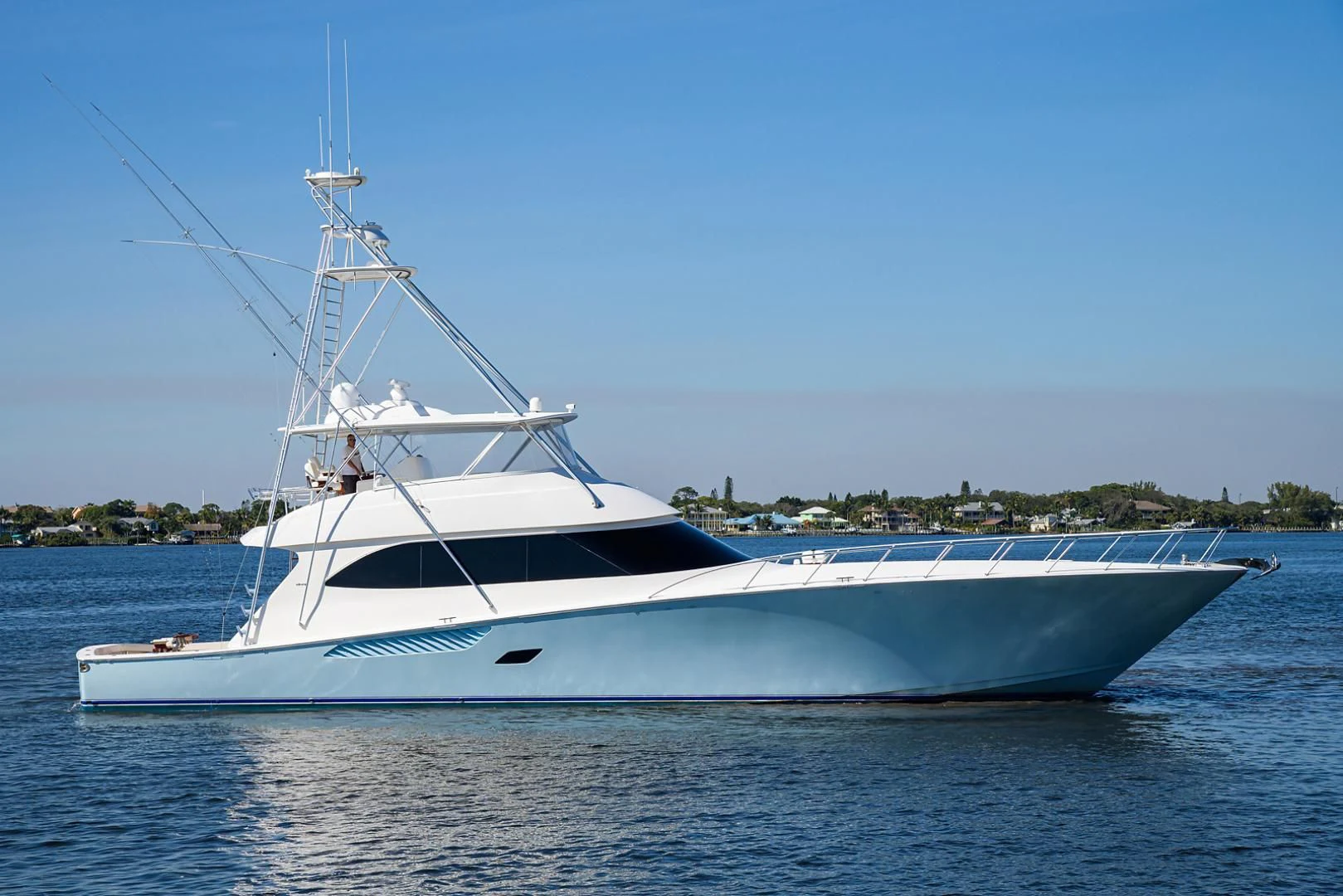 a white boat on the water aboard RITE ANGLER Yacht for Sale