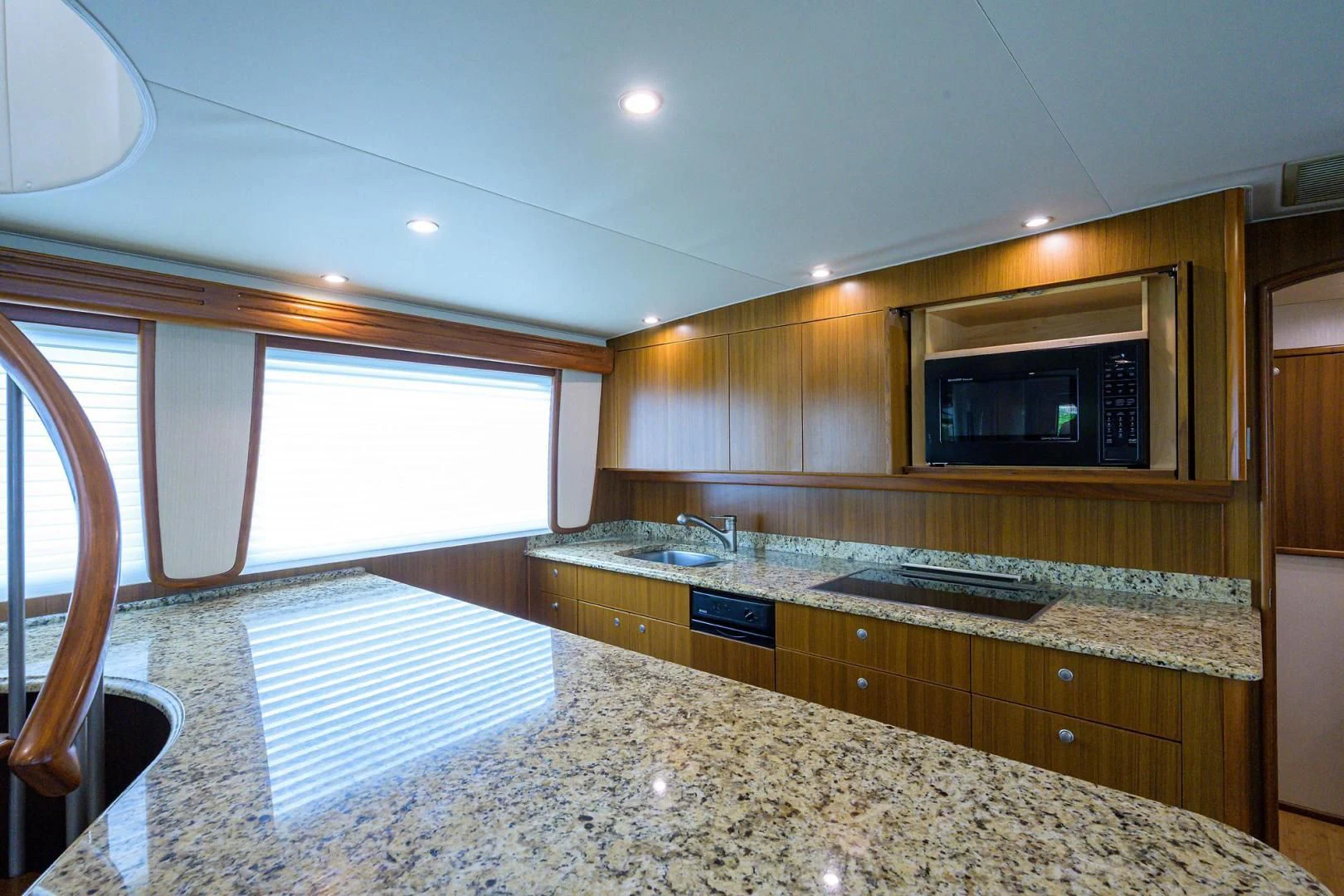 a kitchen with a microwave oven aboard RITE ANGLER Yacht for Sale