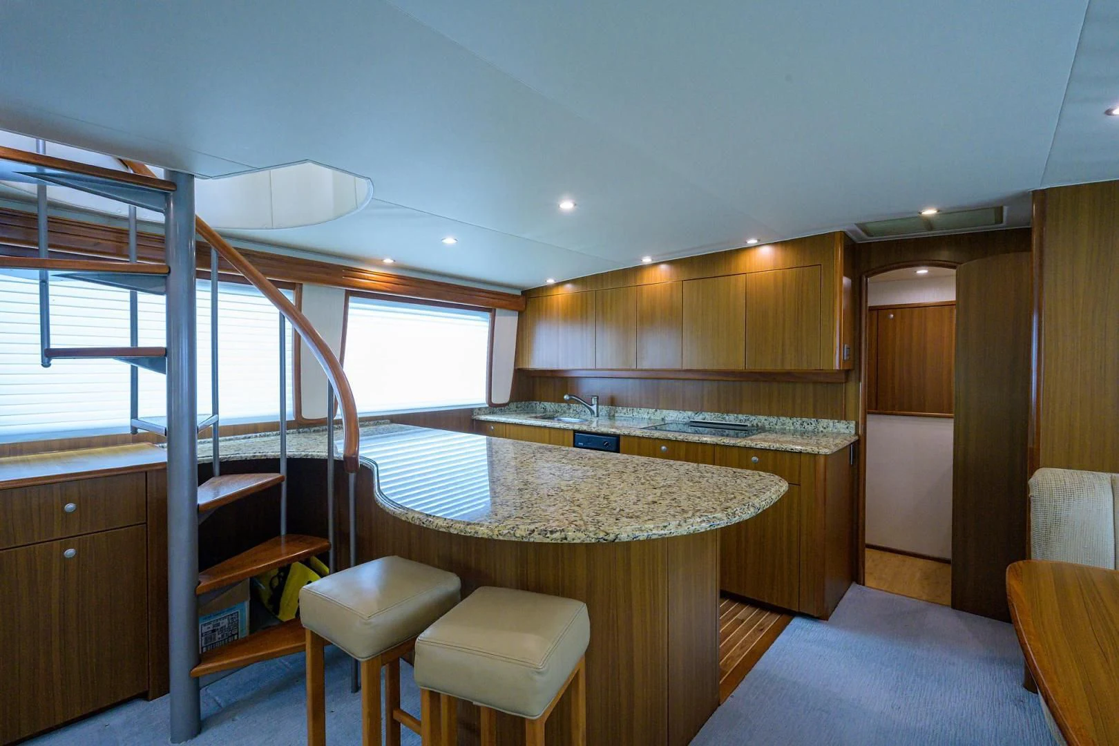 a room with a table and chairs aboard RITE ANGLER Yacht for Sale