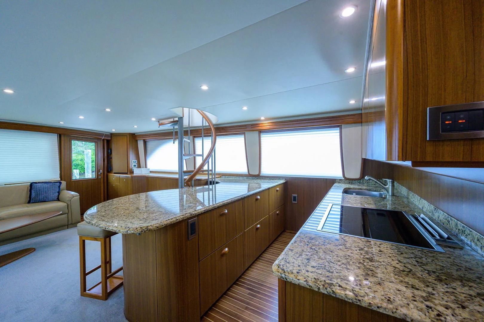 a kitchen with a large island aboard RITE ANGLER Yacht for Sale