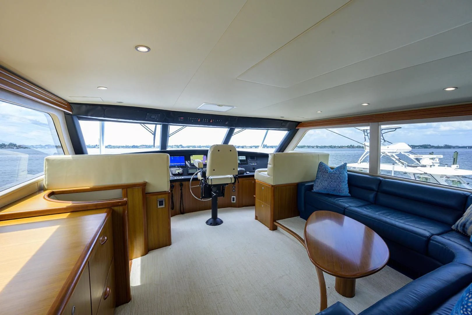 inside of a vehicle with a couch and a chair aboard RITE ANGLER Yacht for Sale