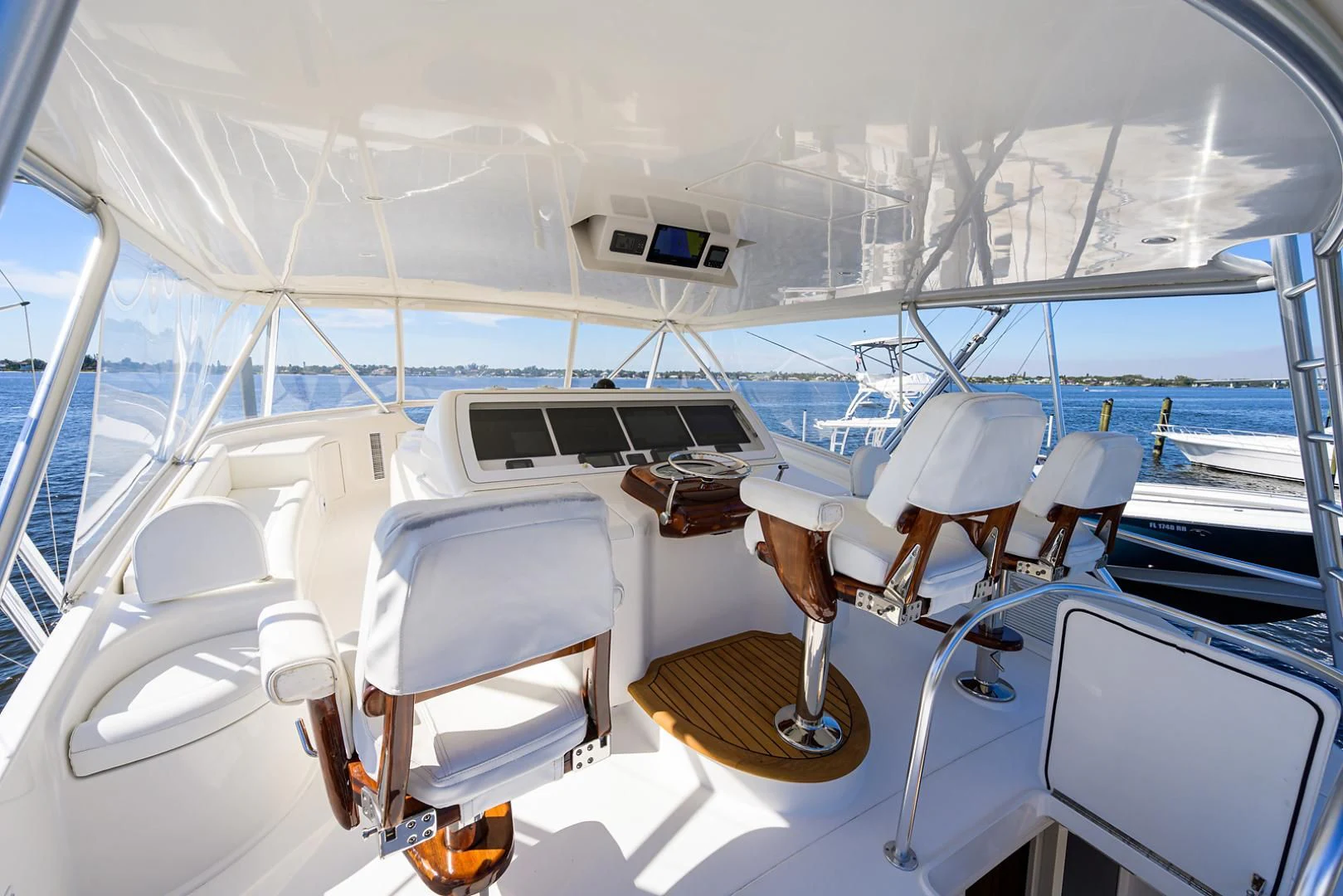 a boat with a seat and a table on it aboard RITE ANGLER Yacht for Sale