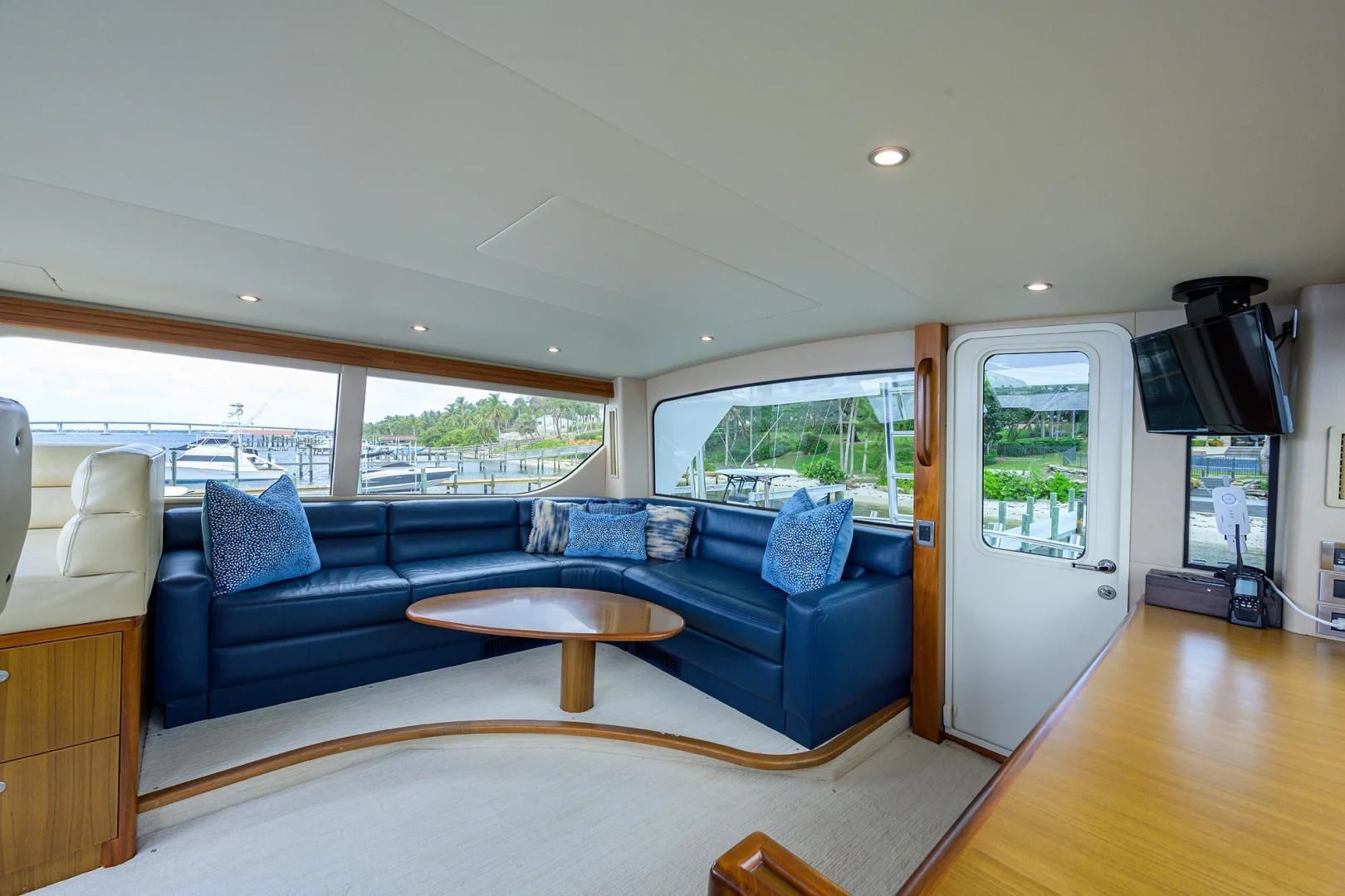 a living room with a couch and a table aboard RITE ANGLER Yacht for Sale