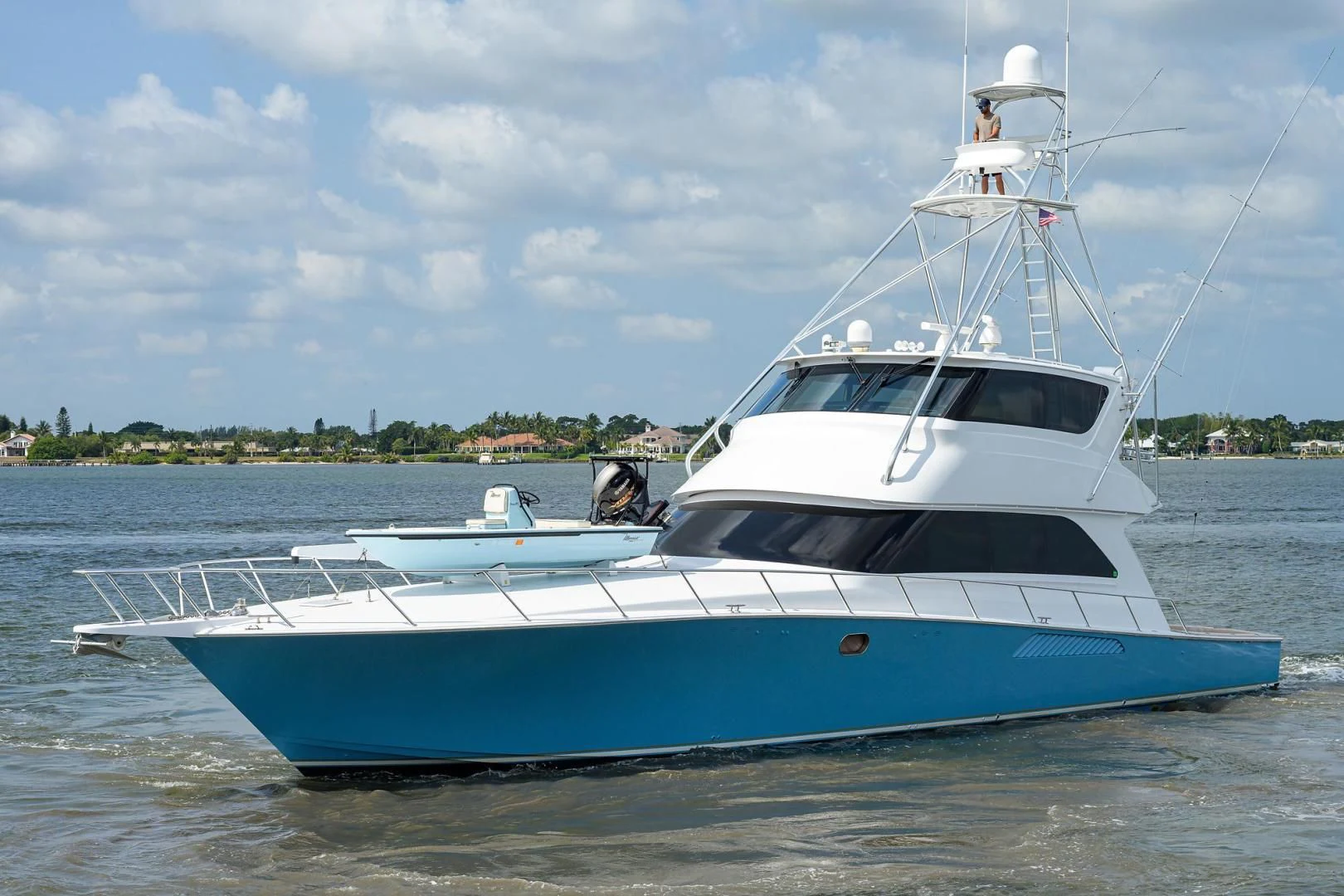 a white boat on the water aboard RITE ANGLER Yacht for Sale