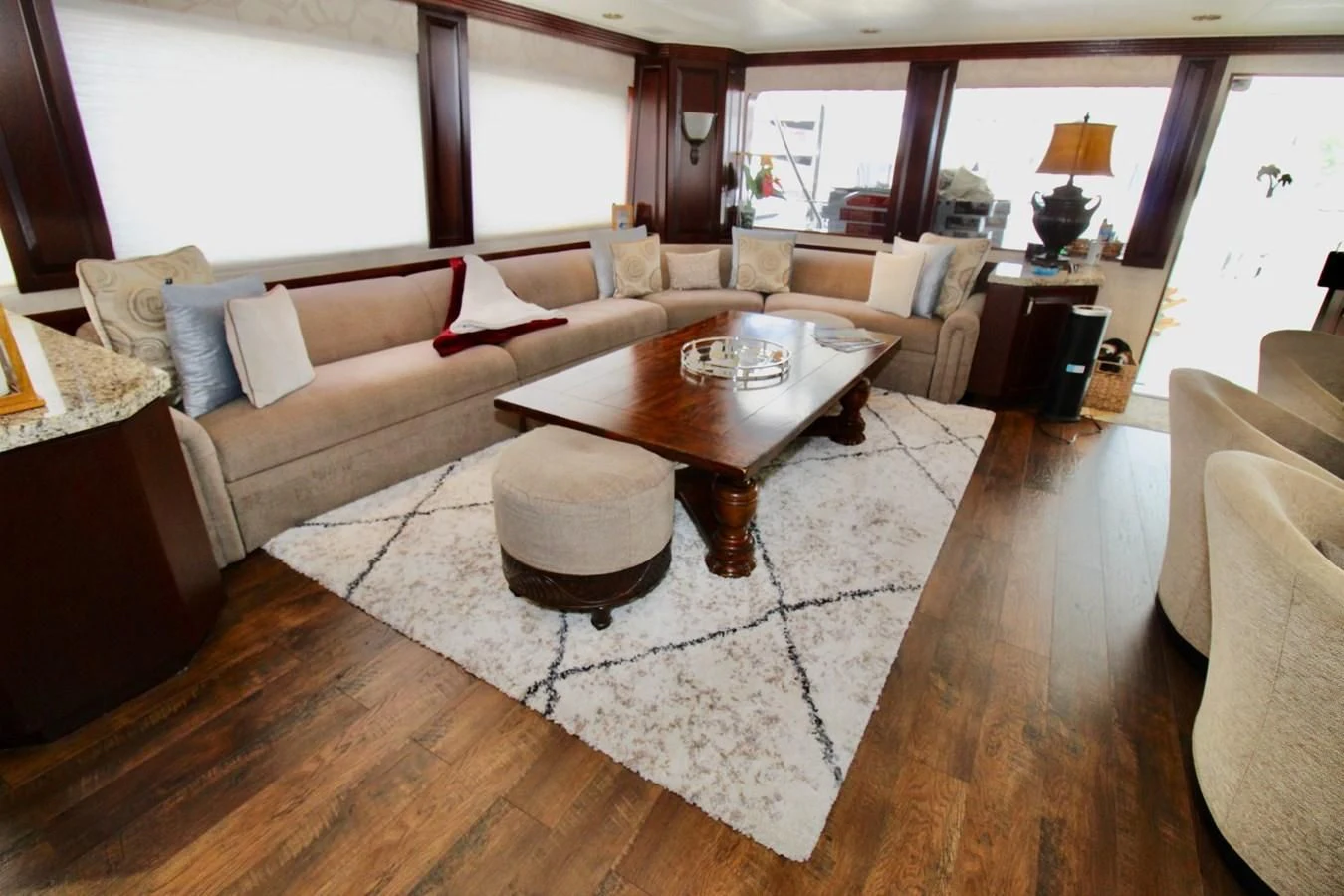 a living room with a large rug aboard NO EXCEPTIONS Yacht for Sale
