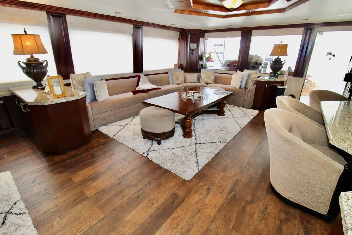 a living room with a large window aboard NO EXCEPTIONS Yacht for Sale