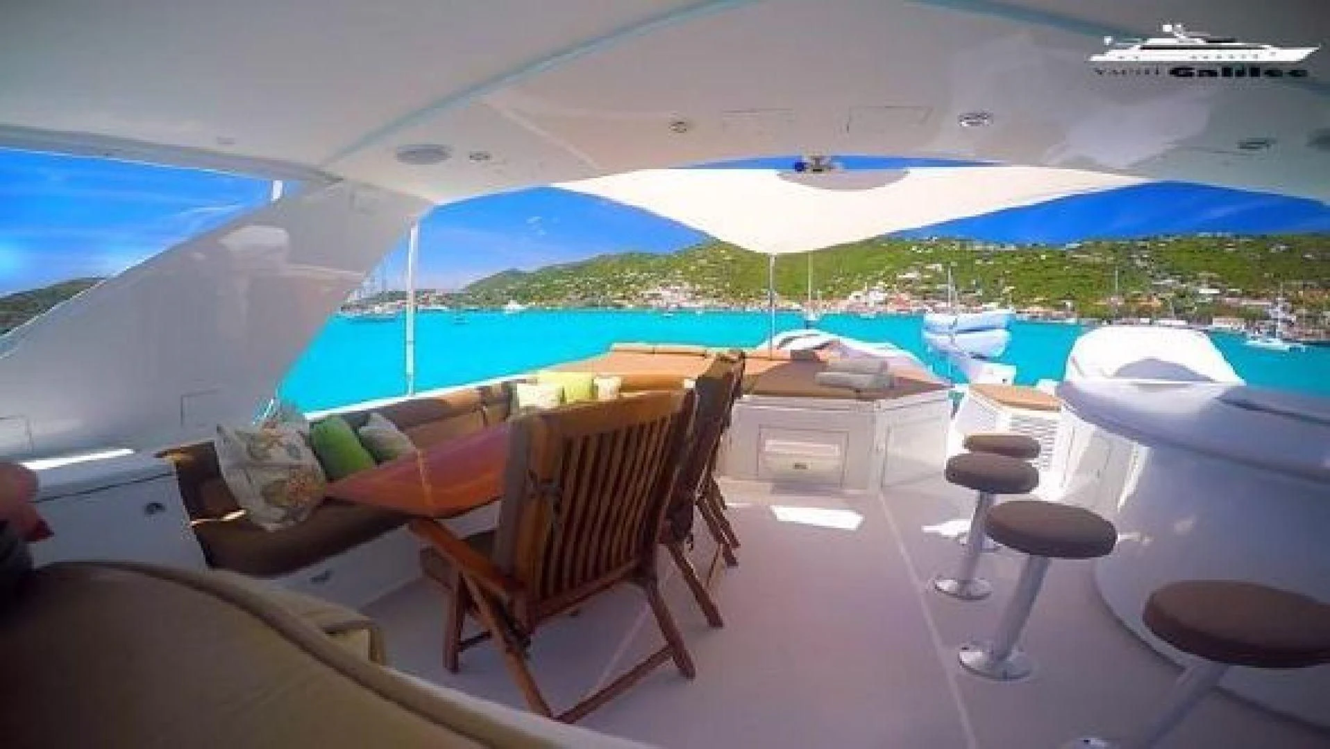 a pool with chairs and tables aboard NO EXCEPTIONS Yacht for Sale