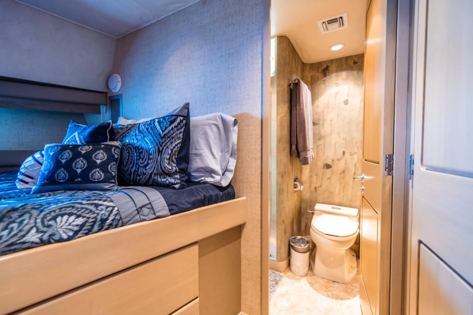 a bed in a room aboard NO EXCEPTIONS Yacht for Sale