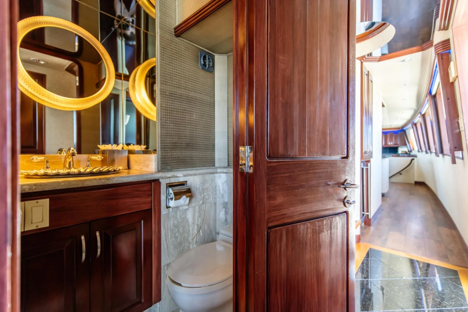 a bathroom with a sink and toilet aboard NO EXCEPTIONS Yacht for Sale