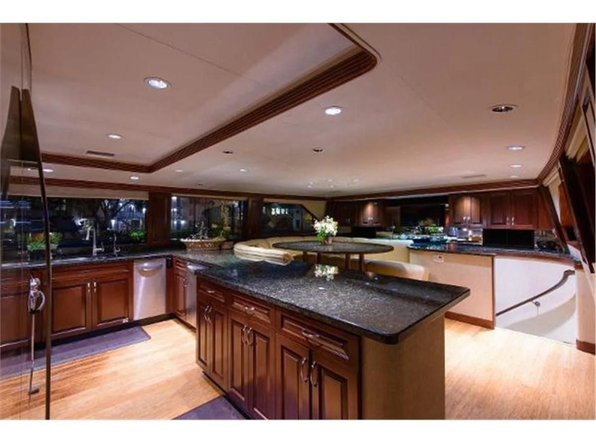 a kitchen with a large island aboard NO EXCEPTIONS Yacht for Sale