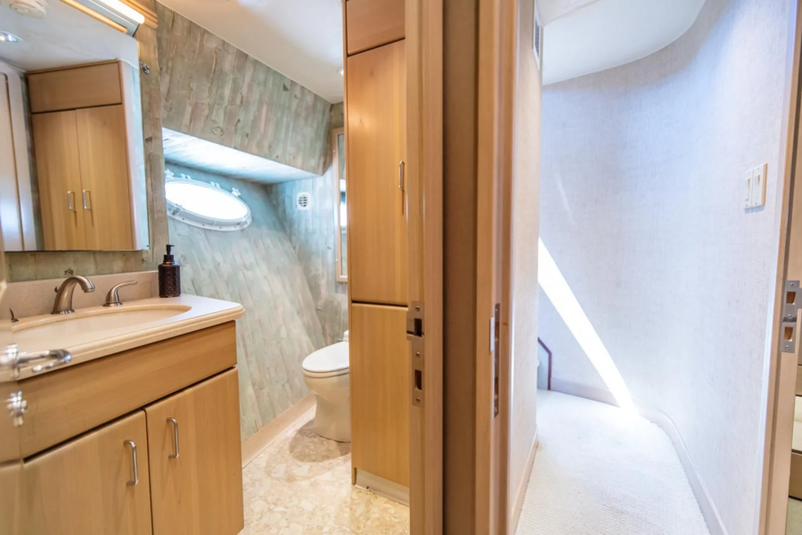 a bathroom with a tub sink and toilet aboard NO EXCEPTIONS Yacht for Sale