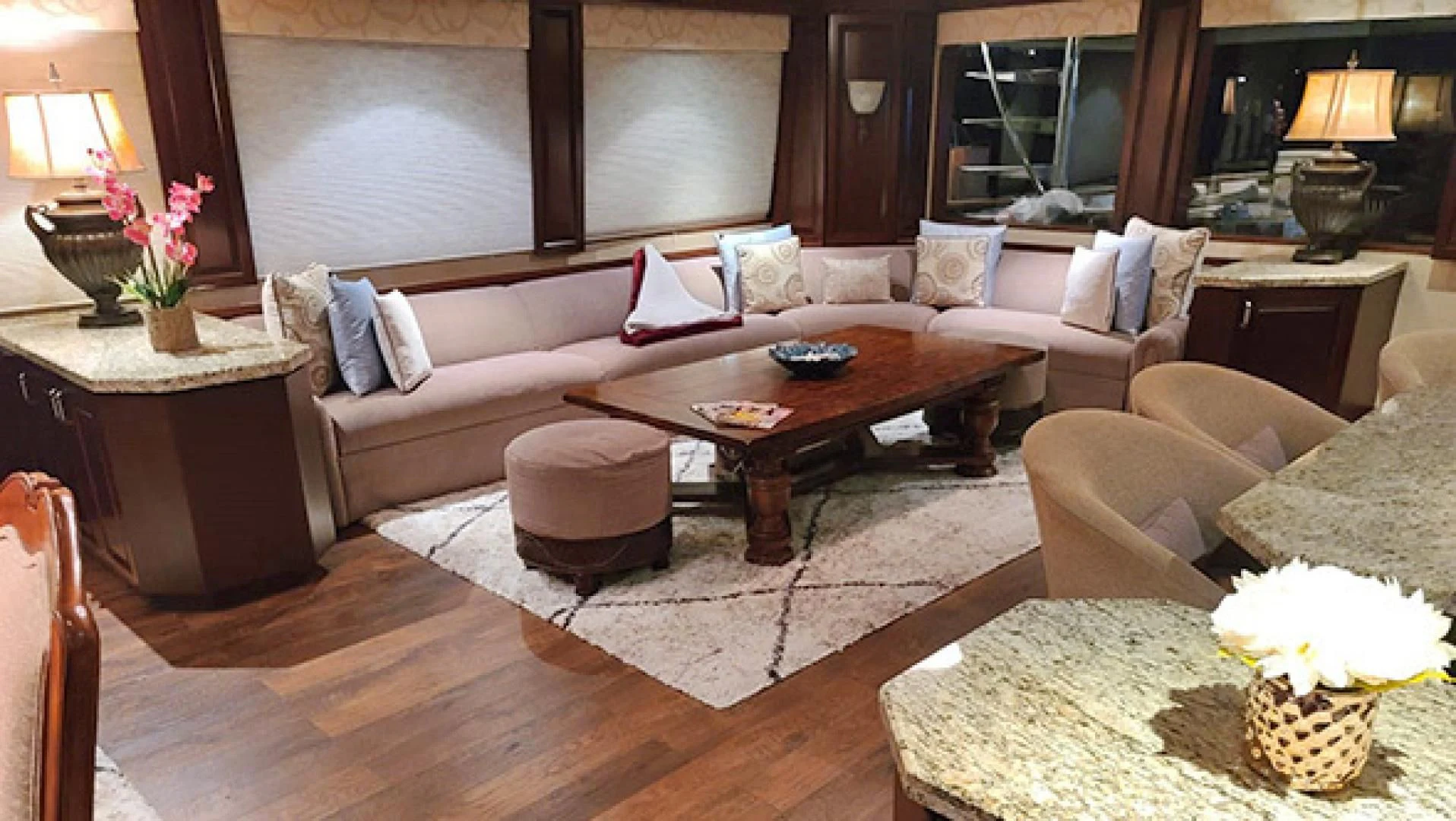 a living room with a couch and a coffee table aboard NO EXCEPTIONS Yacht for Sale