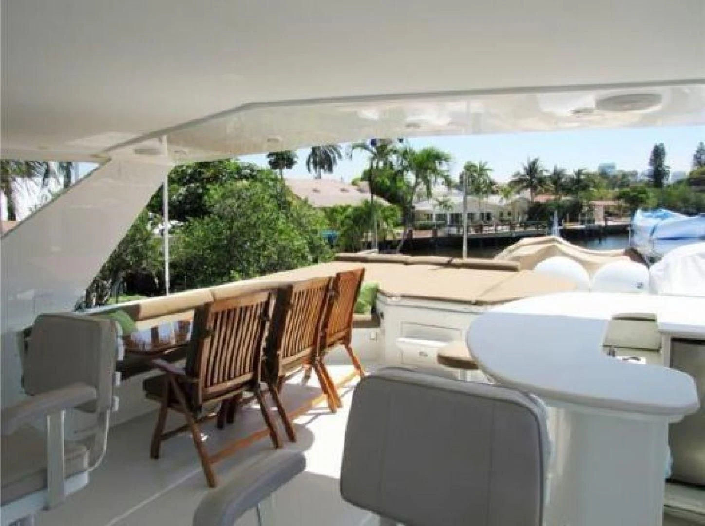 a room with chairs and tables aboard NO EXCEPTIONS Yacht for Sale