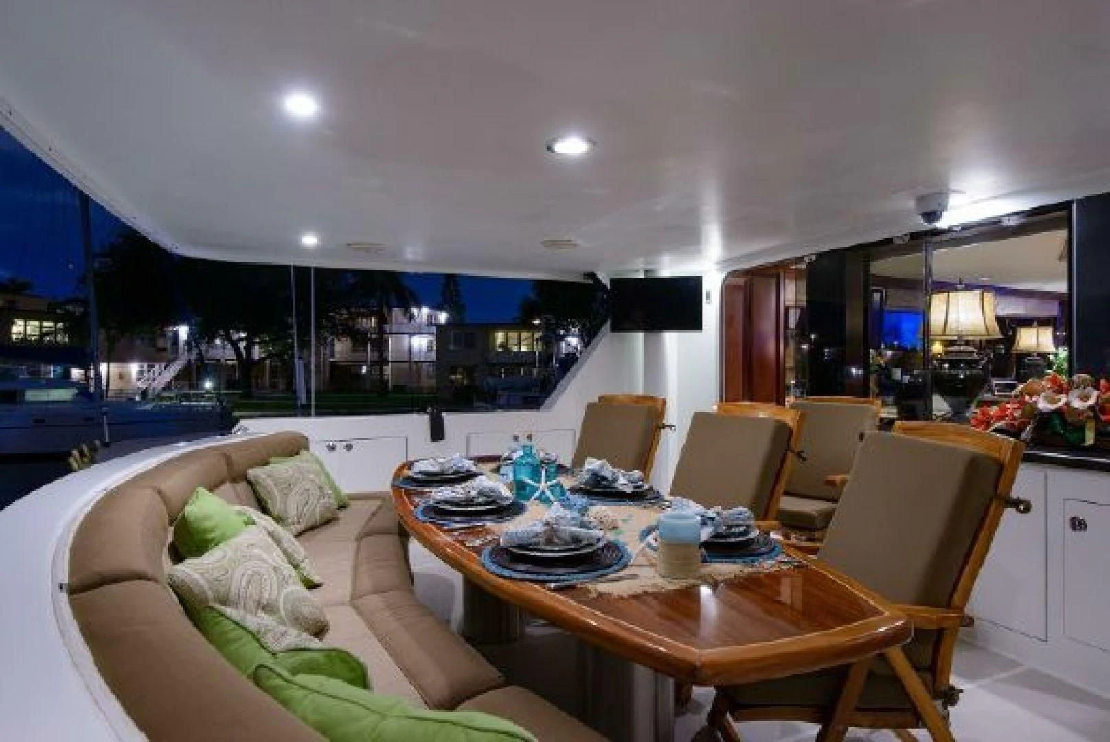 a living room with a dining table aboard NO EXCEPTIONS Yacht for Sale