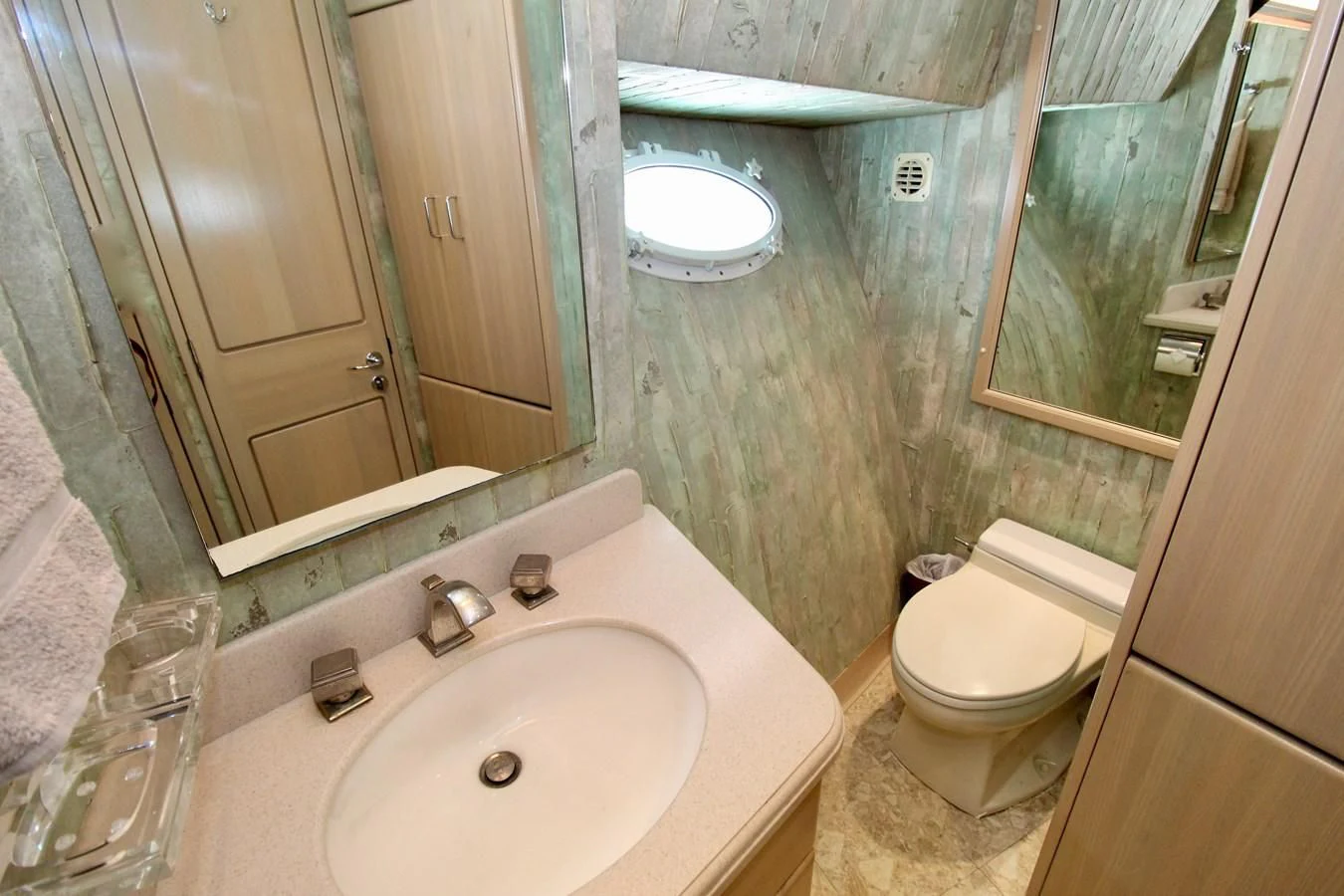 a bathroom with a sink and a toilet aboard NO EXCEPTIONS Yacht for Sale