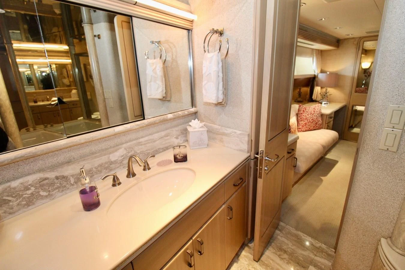 a bathroom with a sink and a mirror aboard NO EXCEPTIONS Yacht for Sale
