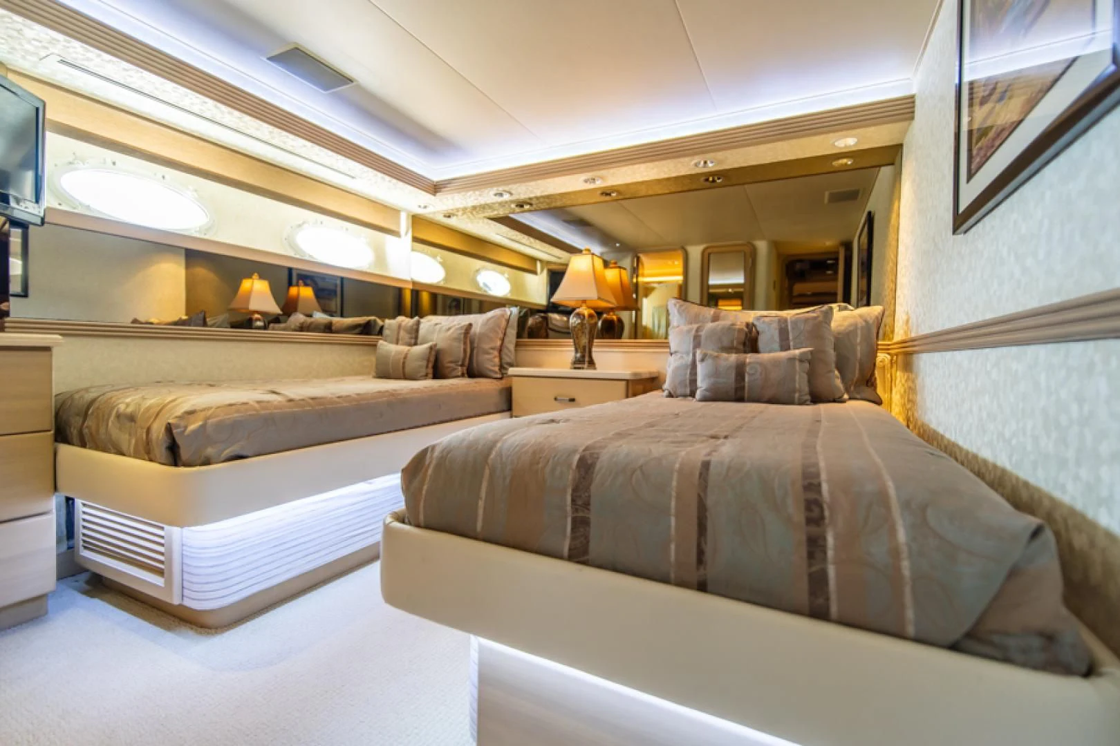 a room with a bed and a couch aboard NO EXCEPTIONS Yacht for Sale