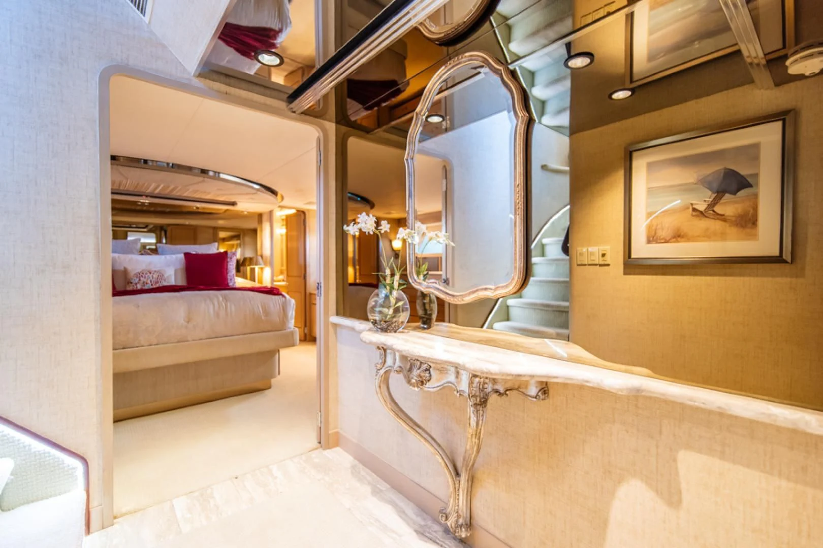 a room with a mirror and a bed aboard NO EXCEPTIONS Yacht for Sale