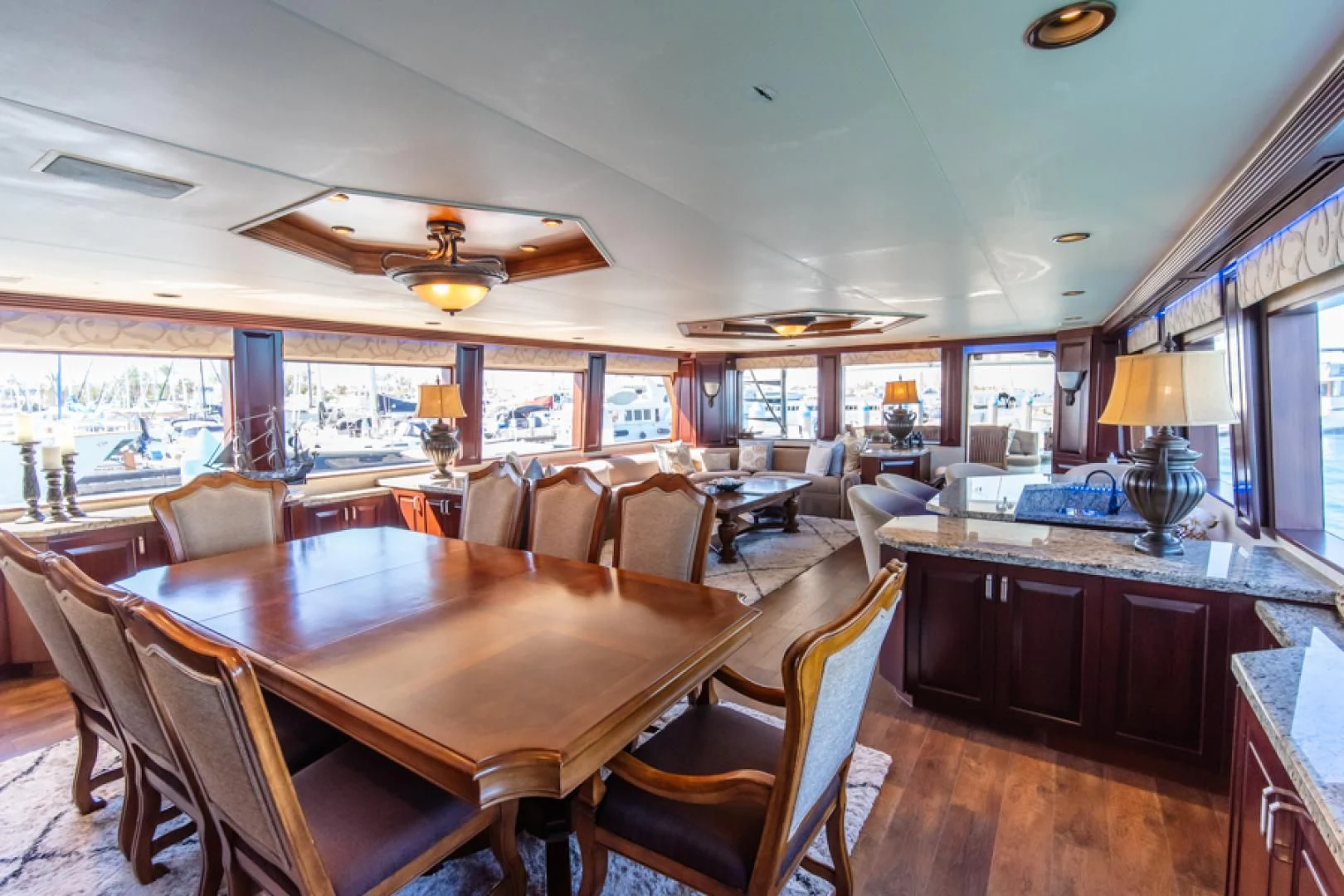 a large dining room with a large table and chairs aboard NO EXCEPTIONS Yacht for Sale