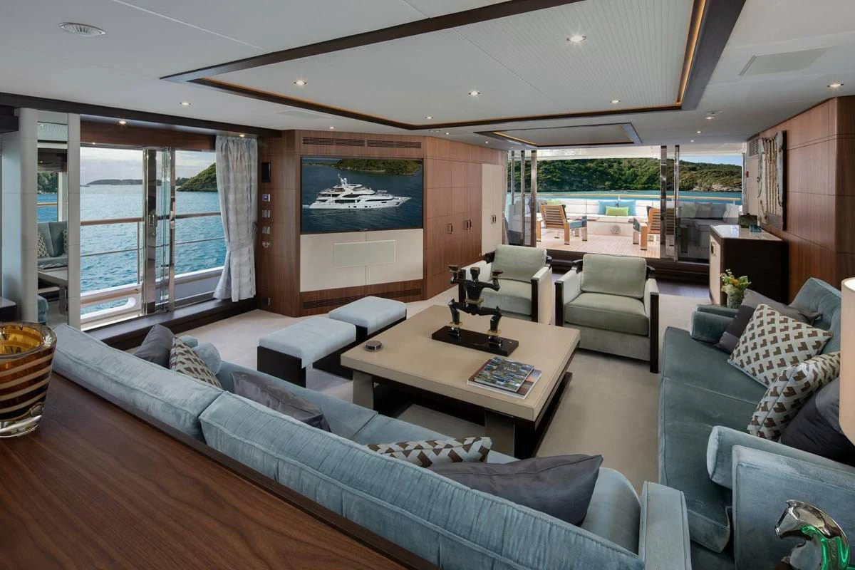 a living room with a large window aboard JODI ANN Yacht for Charter