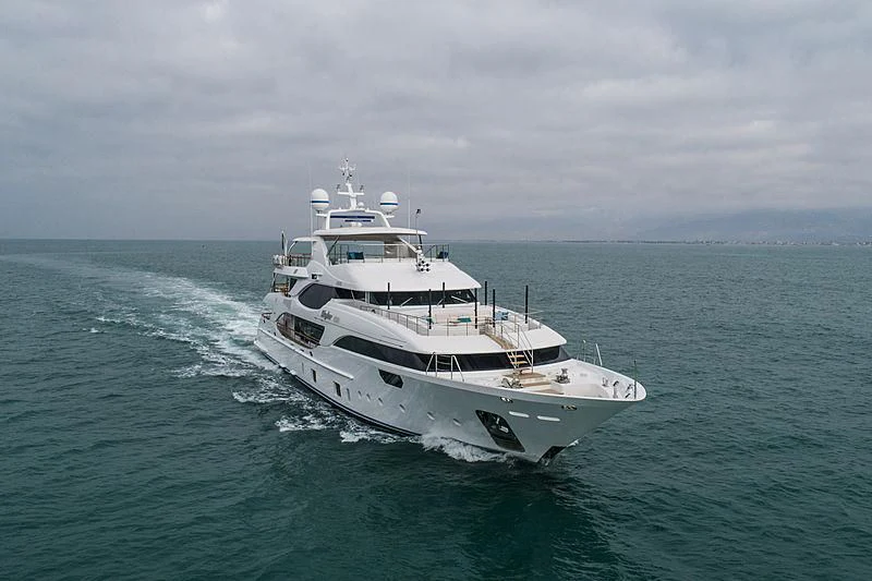a white yacht in the ocean aboard JODI ANN Yacht for Charter
