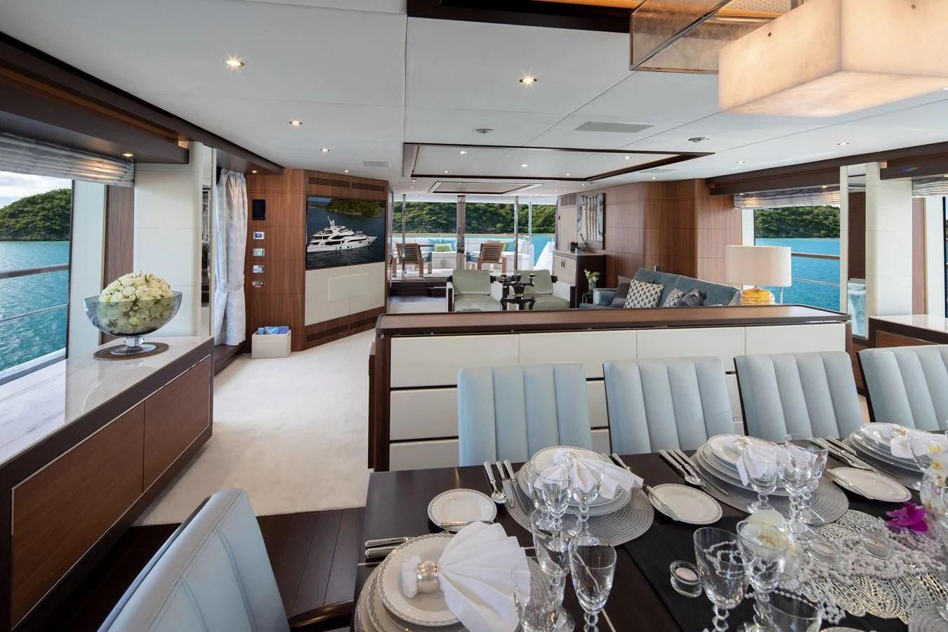 a dining room with a large table aboard JODI ANN Yacht for Charter