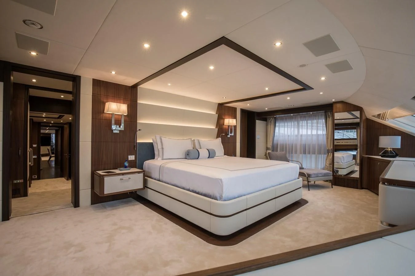 a large bedroom with a large bed aboard JODI ANN Yacht for Charter