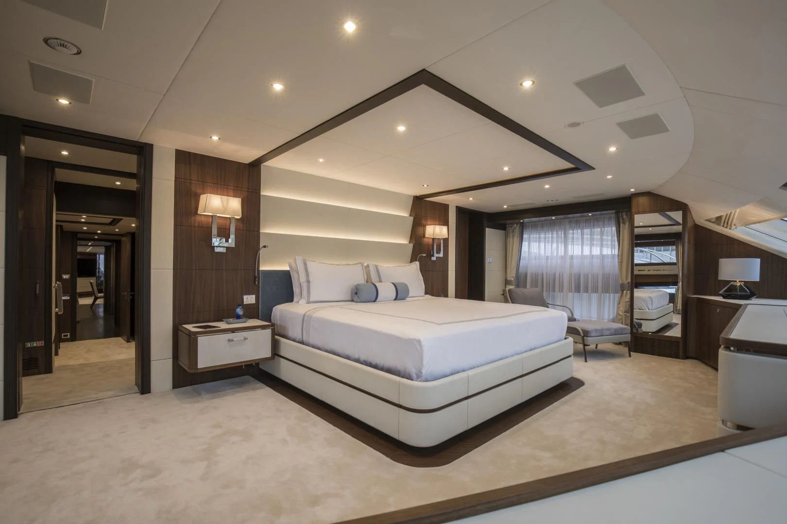 a large bedroom with a large bed aboard JODI ANN Yacht for Charter