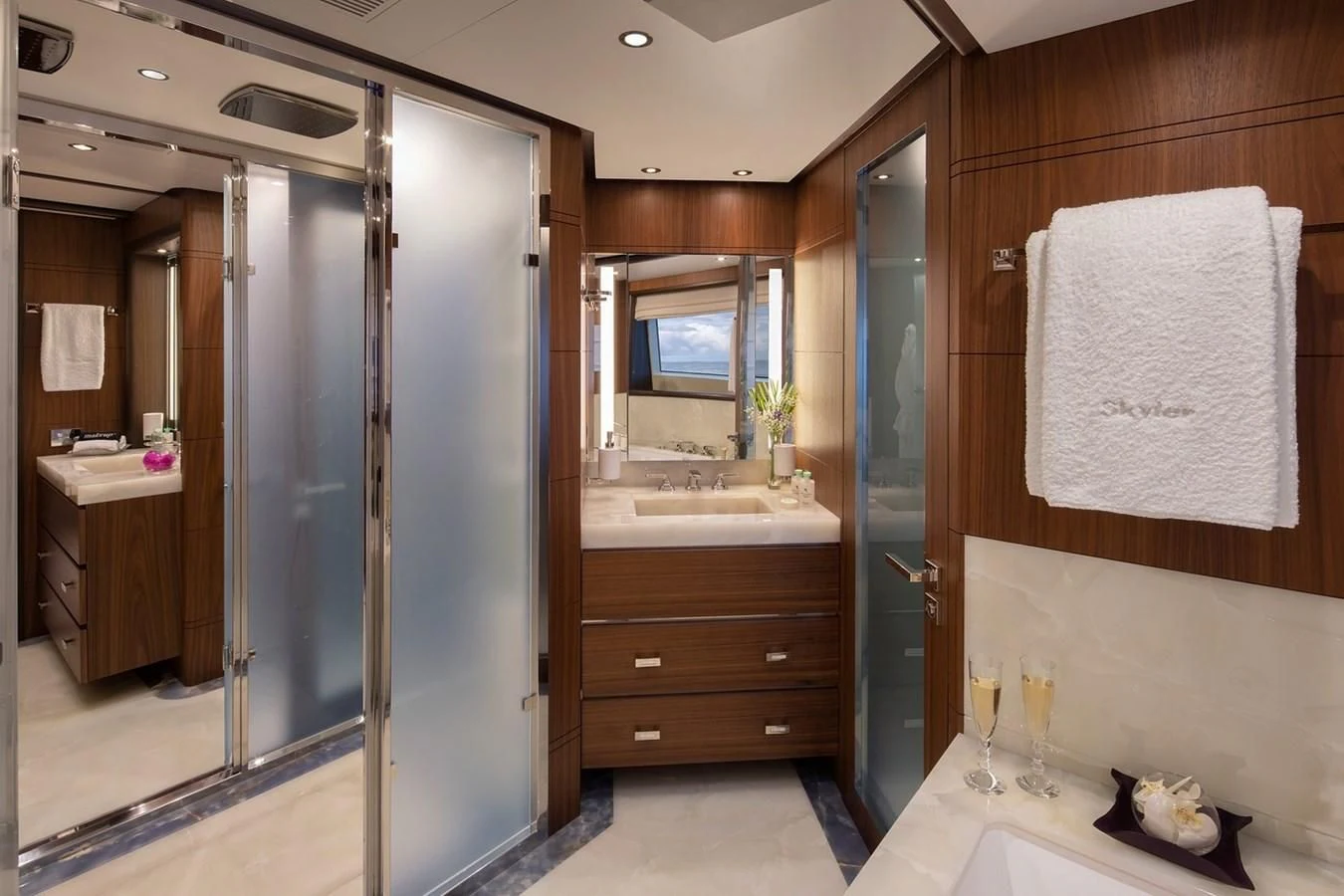 a bathroom with a shower unit and sink aboard JODI ANN Yacht for Charter