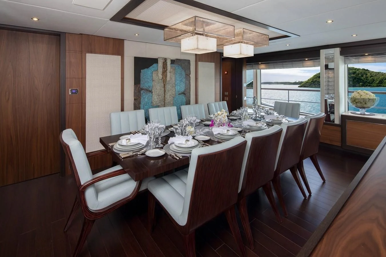 a dining room with a table and chairs aboard JODI ANN Yacht for Charter