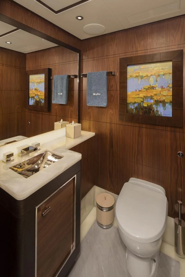 a bathroom with a sink and a toilet aboard JODI ANN Yacht for Charter