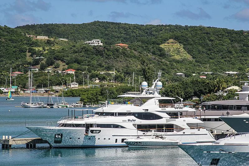 a group of boats in a harbor aboard JODI ANN Yacht for Charter
