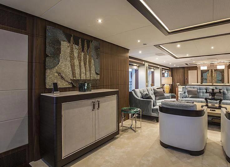 a living room with a large screen aboard JODI ANN Yacht for Charter